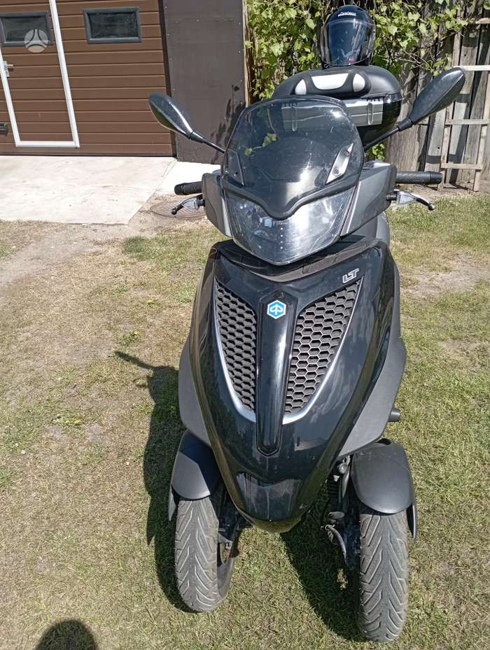 Piaggio MP3, трициклы