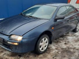 Mazda 323F по частям. Automobilis ardomas dalimis запасные части автомобил