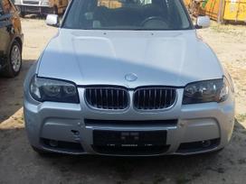 BMW X3 dalimis. 6 pavaros odinis salonas kablys
