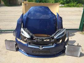 Tesla Model S dalimis. широкий ассортимент новых и б у деталей к автомобилям te