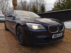 BMW 7 serija M paketas juodos lubos duru pritraukejai kablys