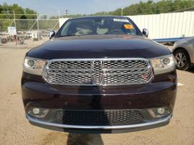 Dodge Durango Citadel perkant naudotą autodetalę ir keičiant ją mūsų autose
