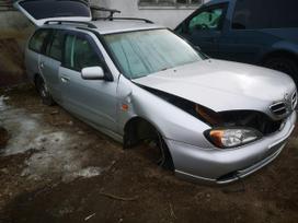 Nissan Primera dalimis. Automobilis ardomas dalimis запасные части автомобиля