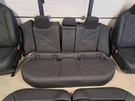 BMW iX Salonas dalimis priekinių sėdynių nėra