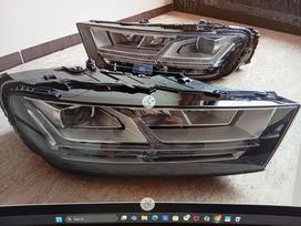 Audi Q7 bamperi, spārni, gaismas