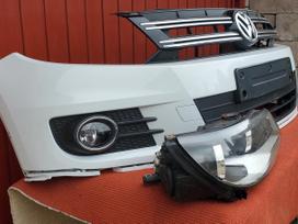 Volkswagen Tiguan Priekiniai bamperiai su park davikliais su žibintų apiplovimais