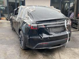 Tesla Model Y dalimis