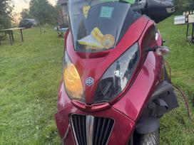 Piaggio MP3, трициклы