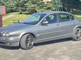 Jaguar X-type dalimis. Du jaguar x type 20