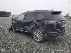 Cadillac Xt6 dalimis. Yra daugiau cadillac