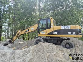 Caterpillar M 318 C, экскаваторы