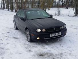 Jaguar X-Type dalimis. Anglas dalimis