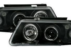 Volkswagen Passat dalimis. Priekiniai tuning žibintai skaidrūs su angel eyes su l