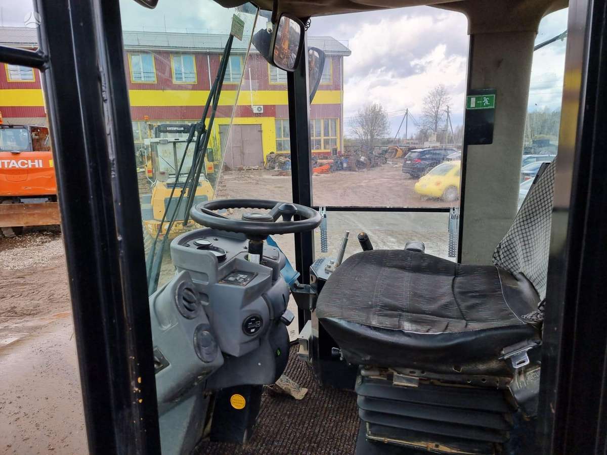 Caterpillar CS 563E, вибромашины