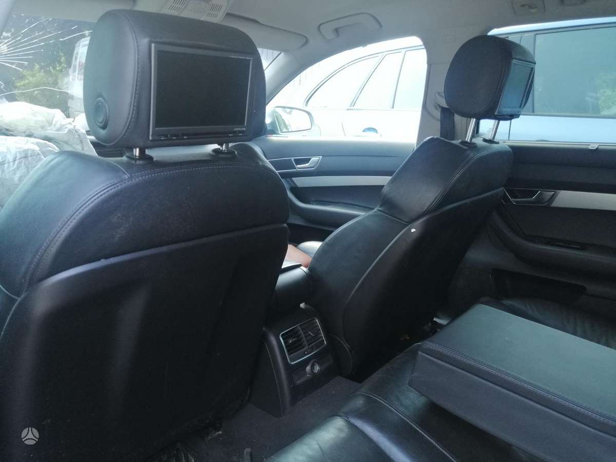 Audi A6 Dalimis bagazines liftas kamera kablys