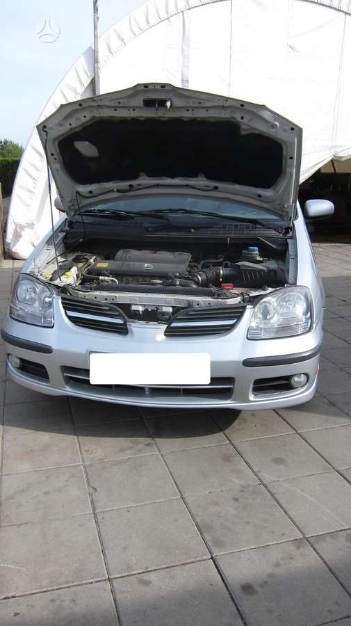 Nissan Almera Tino Dalimis