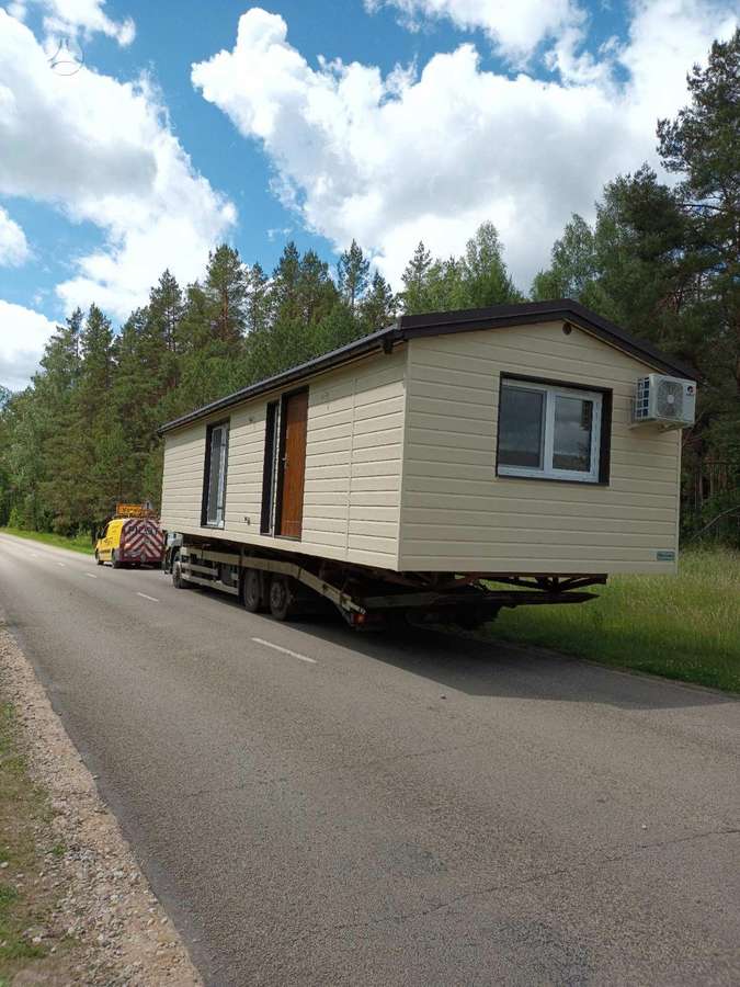 Nameliu, kemperiu, karavanu transportavimas