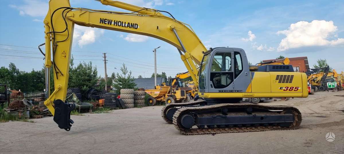 New Holland E385, экскаваторы