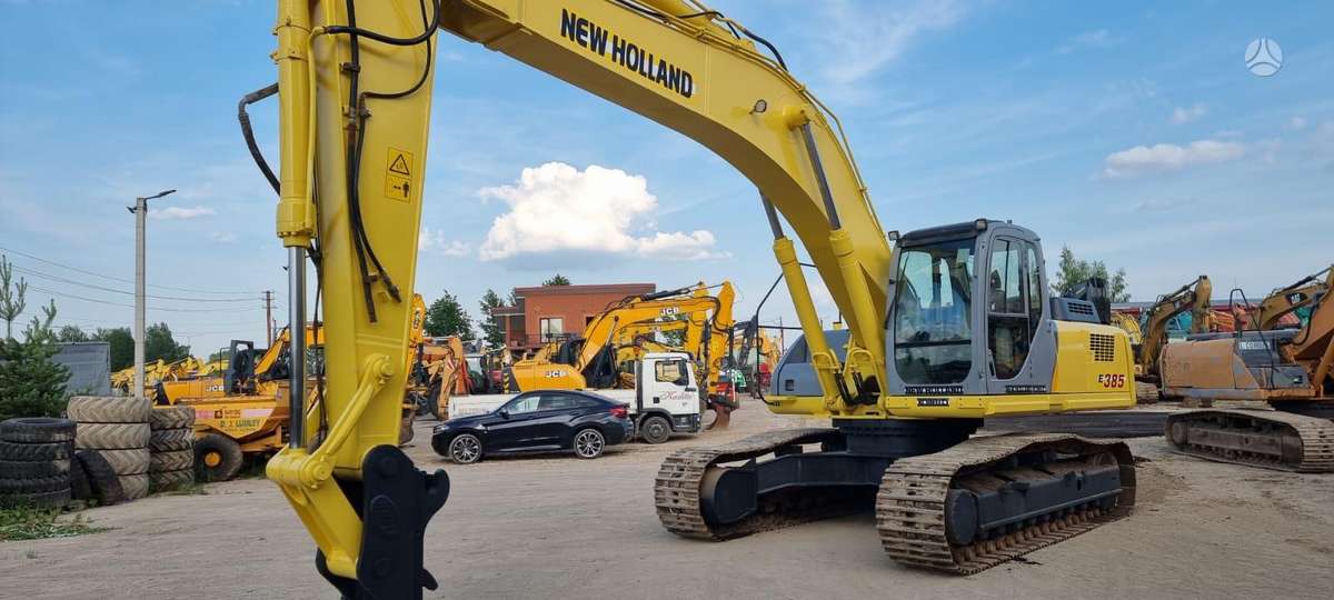 New Holland E385, экскаваторы