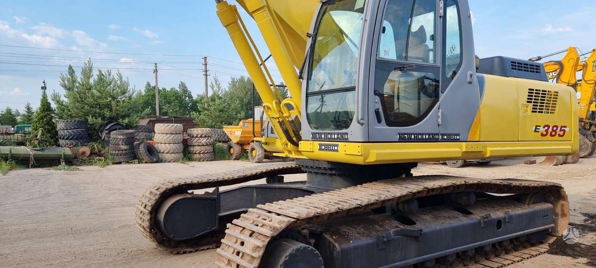 New Holland E385, экскаваторы