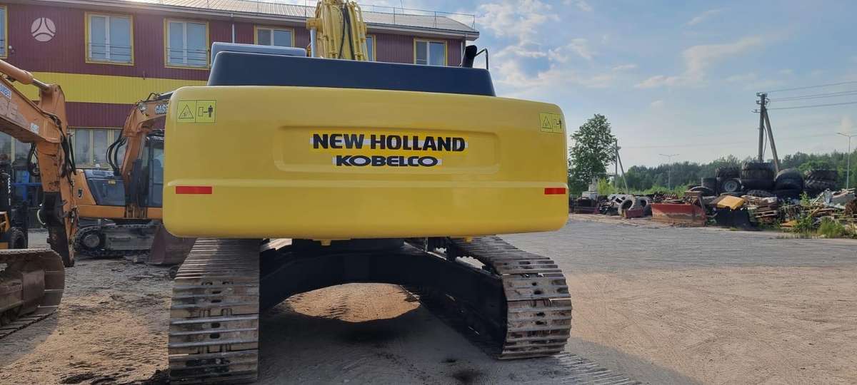 New Holland E385, экскаваторы