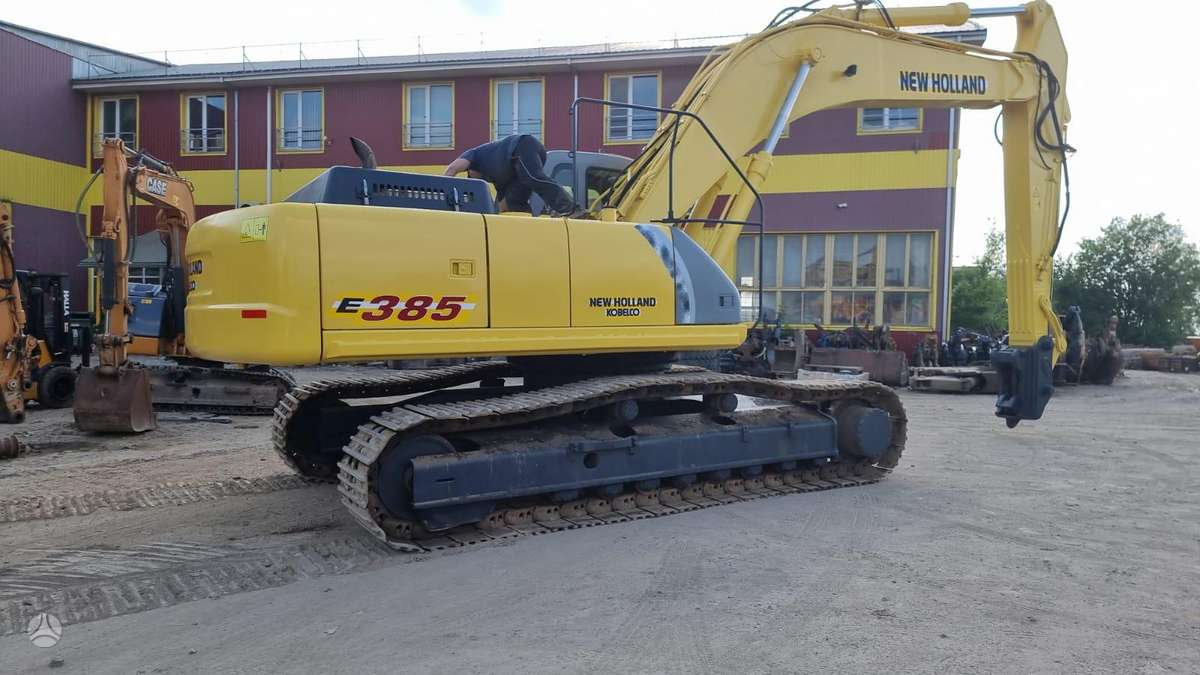 New Holland E385, экскаваторы