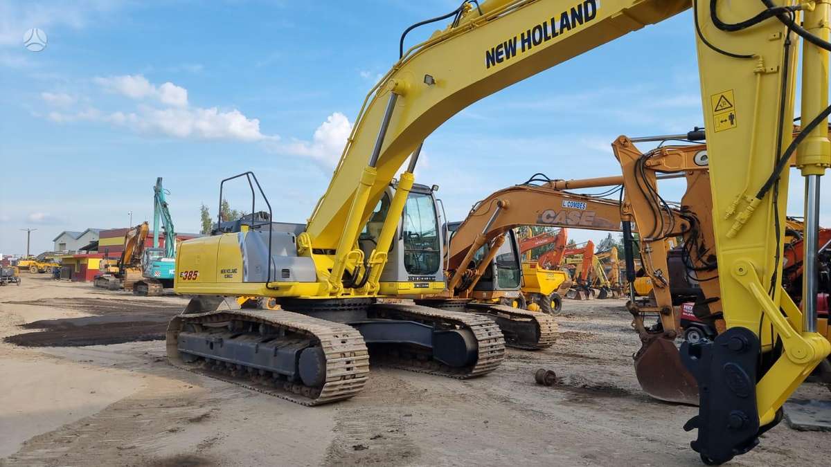 New Holland E385, экскаваторы