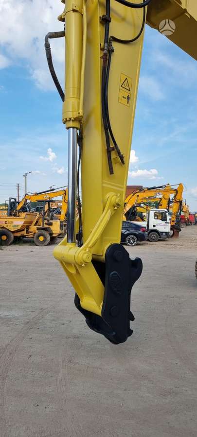 New Holland E385, экскаваторы