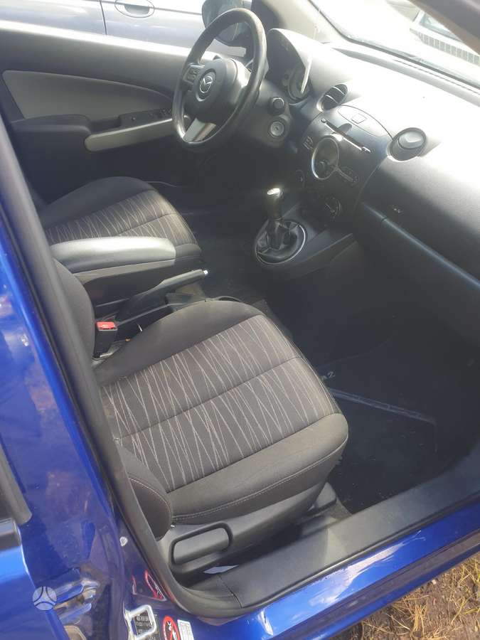Mazda 2 по частям