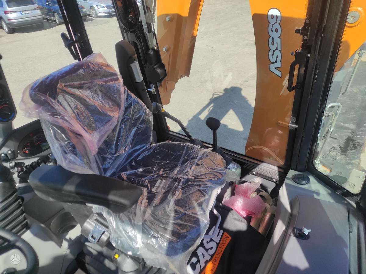 Case 695SV, excavator loader
