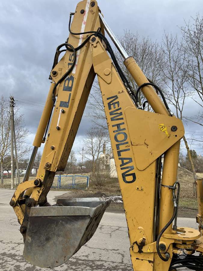 New Holland LB 115, excavator loader