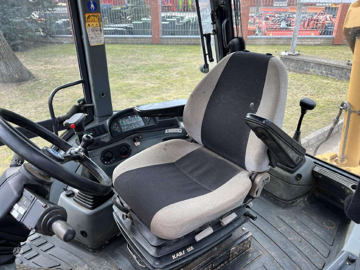 New Holland LB 115, excavator loader