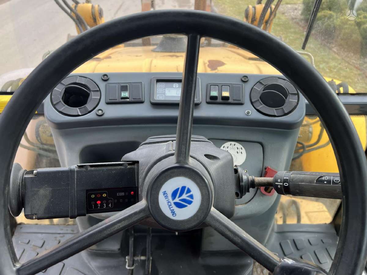 New Holland LB 115, excavator loader