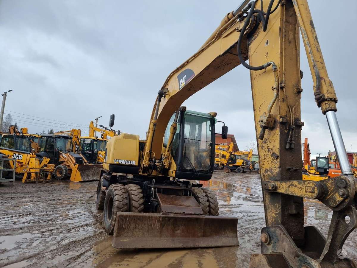 Caterpillar M 313C, экскаваторы