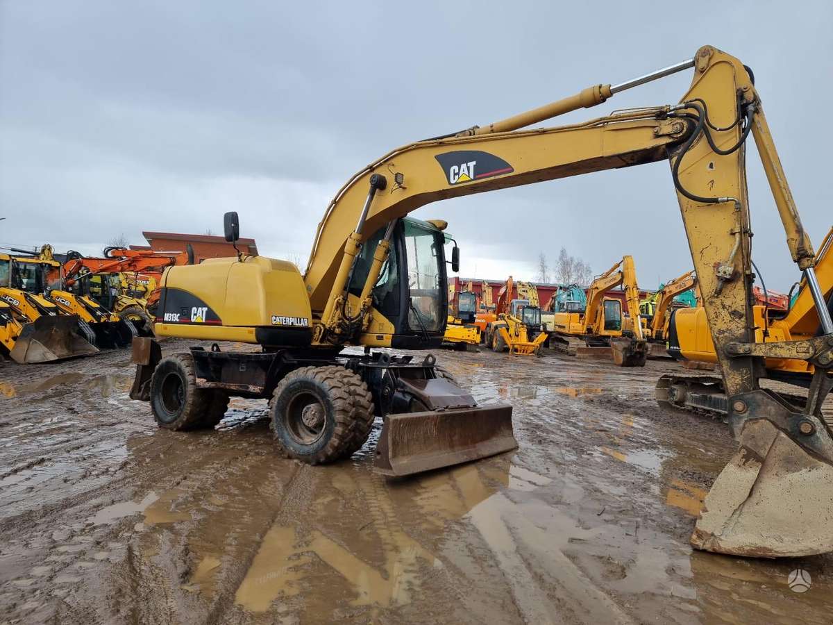 Caterpillar M 313C, ekskavatori