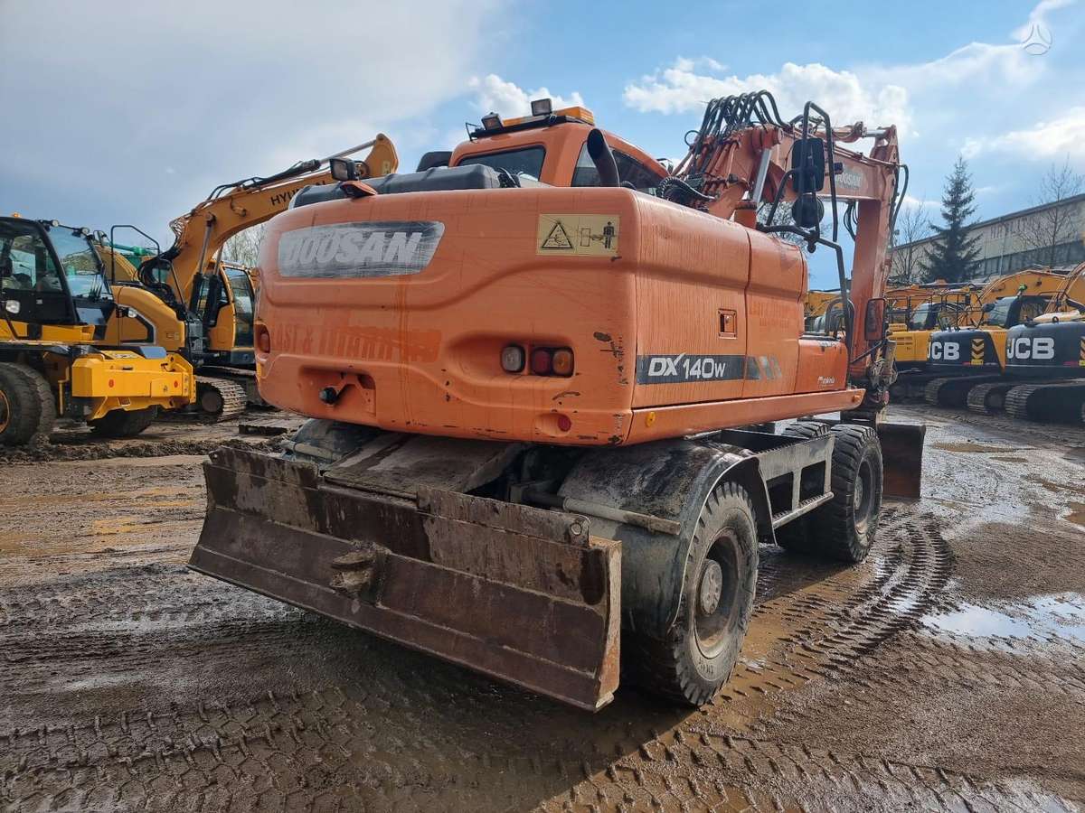 Doosan DX 140W ROTOTILT, экскаваторы