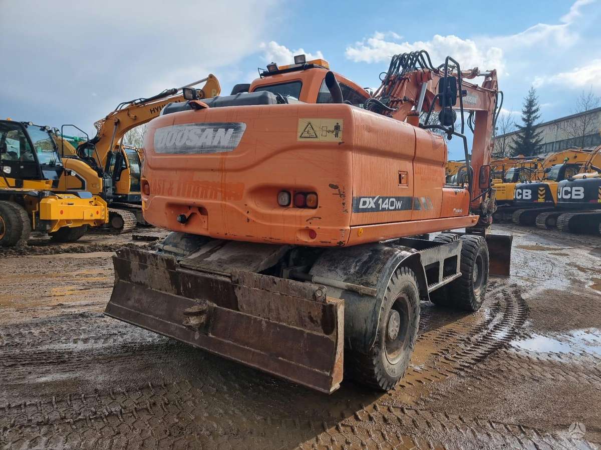 Doosan DX 140W ROTOTILT, excavator
