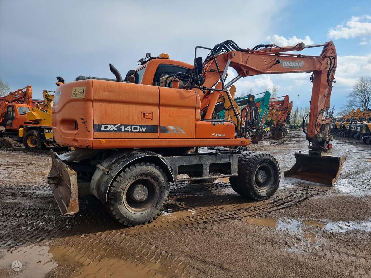 Doosan DX 140W ROTOTILT, экскаваторы