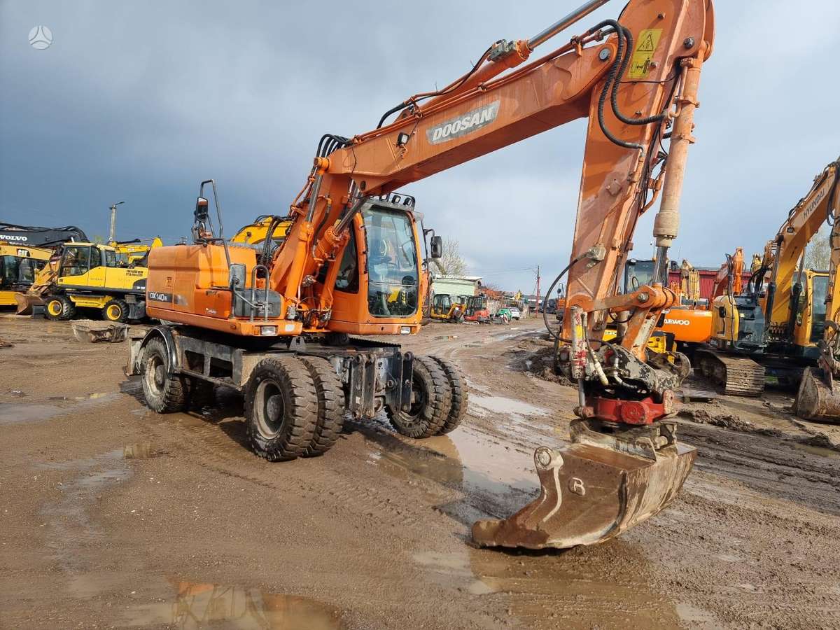 Doosan DX 140W ROTOTILT, экскаваторы