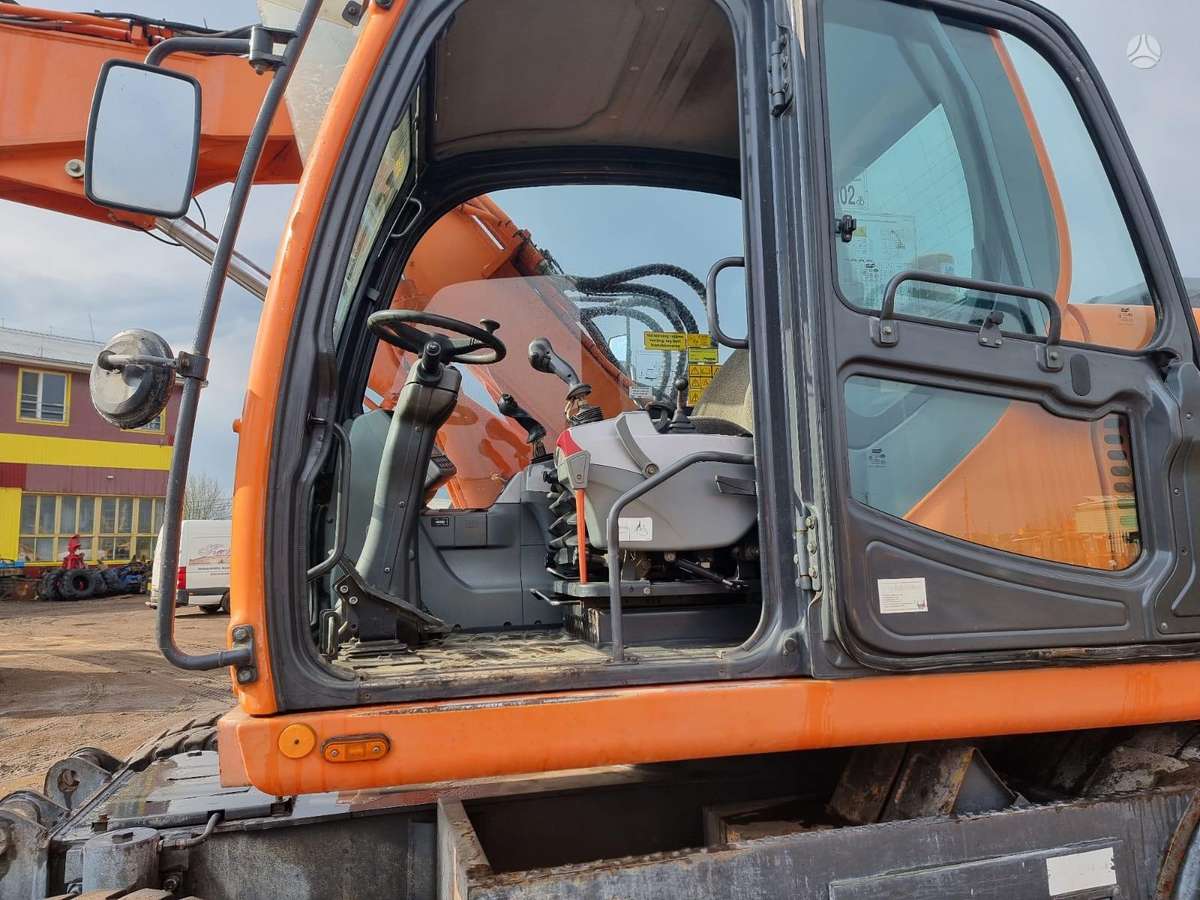 Doosan DX 140W ROTOTILT, экскаваторы