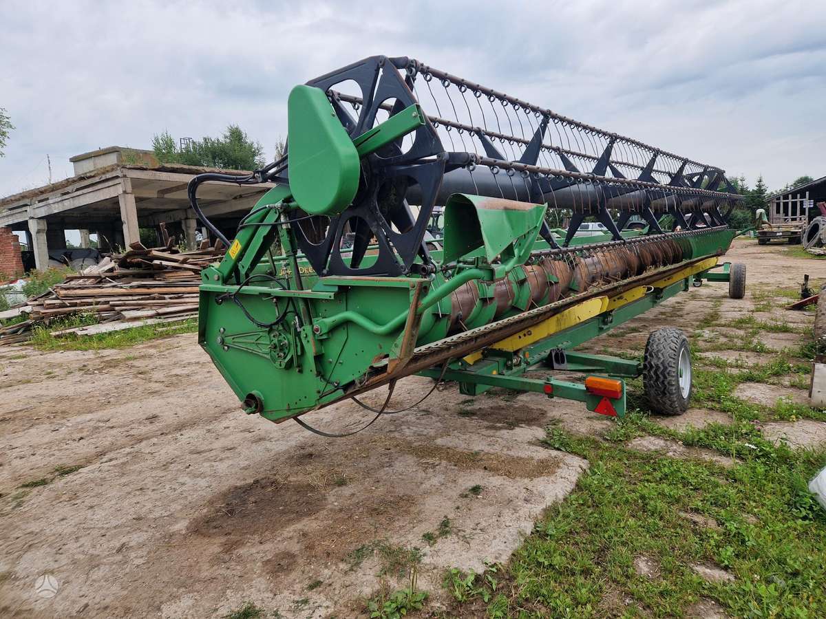 John Deere S690i, kombaini