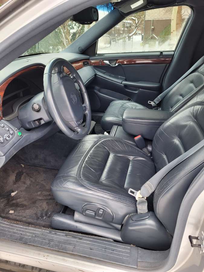 -Kita- Cadillac Deville, autokatafalkai