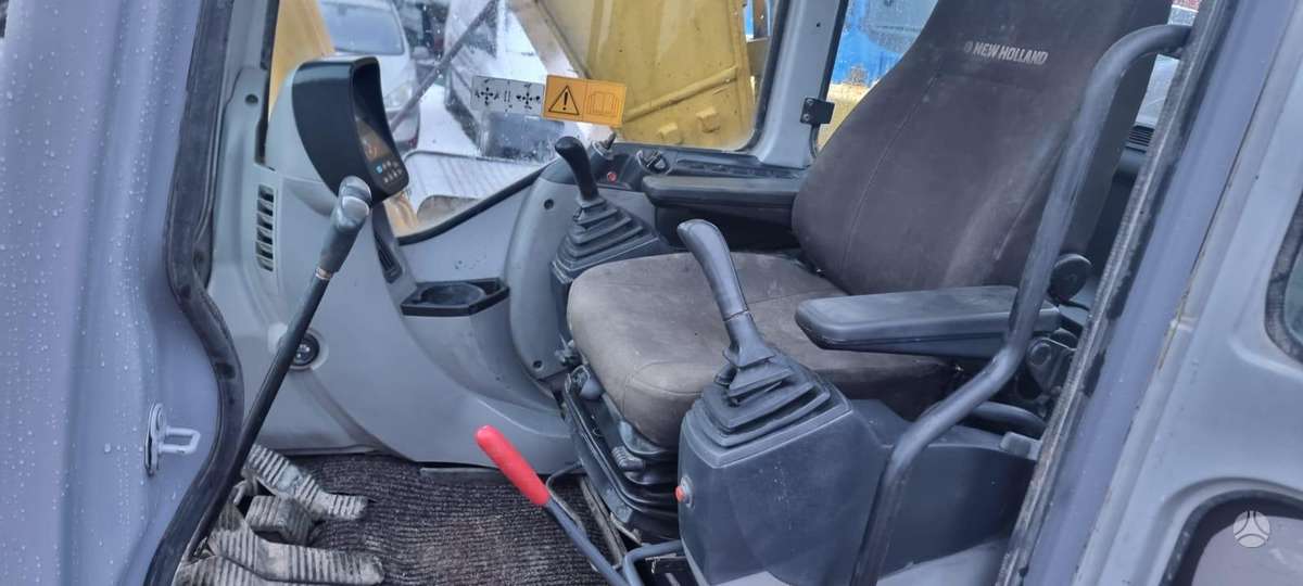 New Holland 215B, экскаваторы