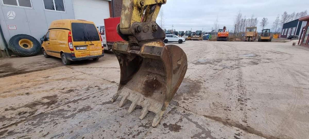 New Holland 215 B, экскаваторы
