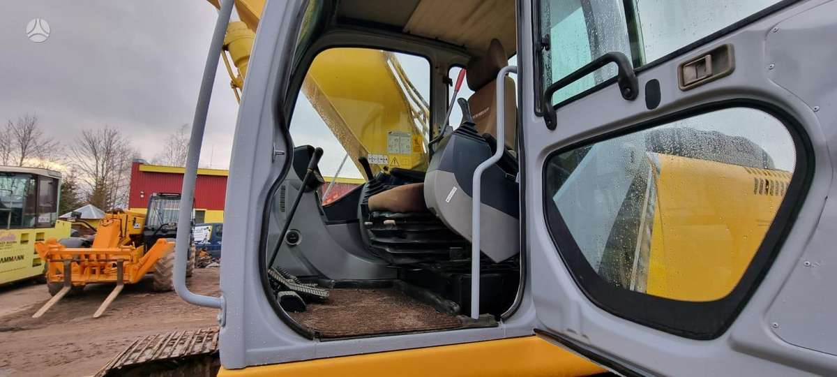 New Holland 215 B, ekskavatoriai
