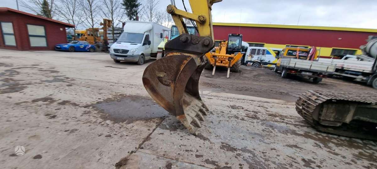 New Holland 215 B, ekskavatoriai