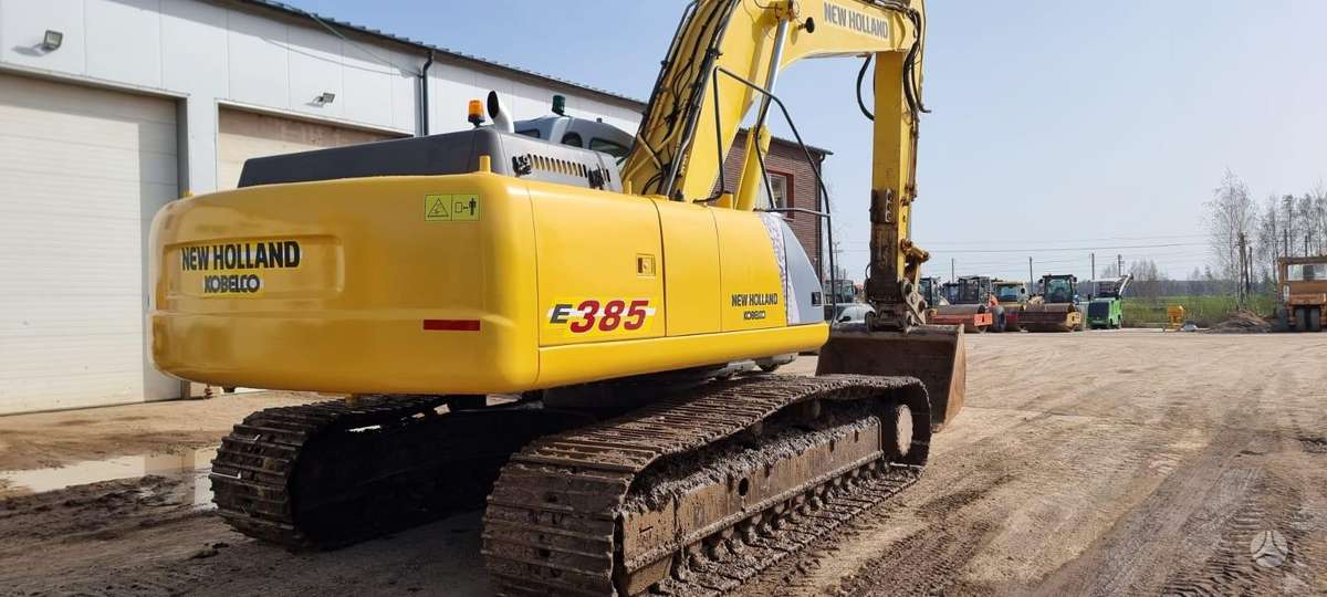 New Holland E 385, экскаваторы
