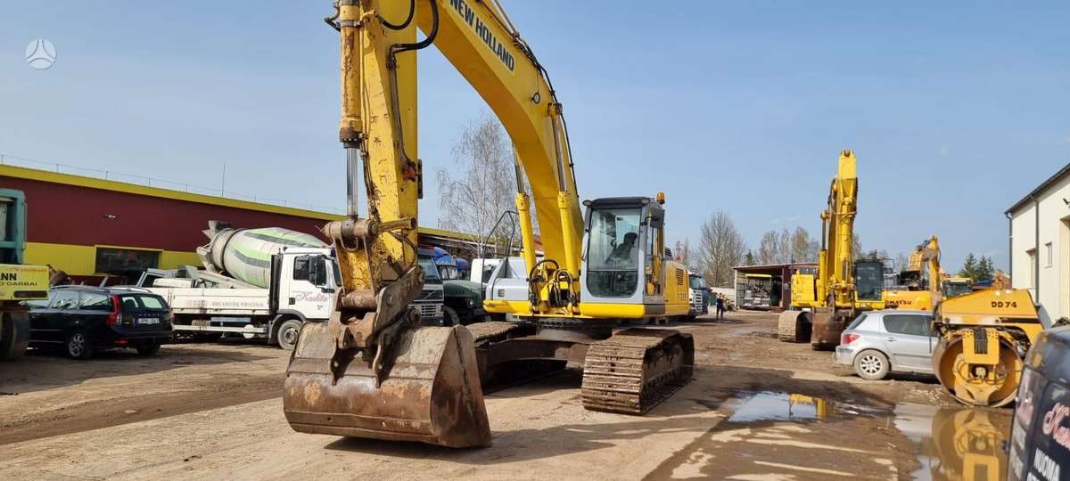New Holland E 385, экскаваторы