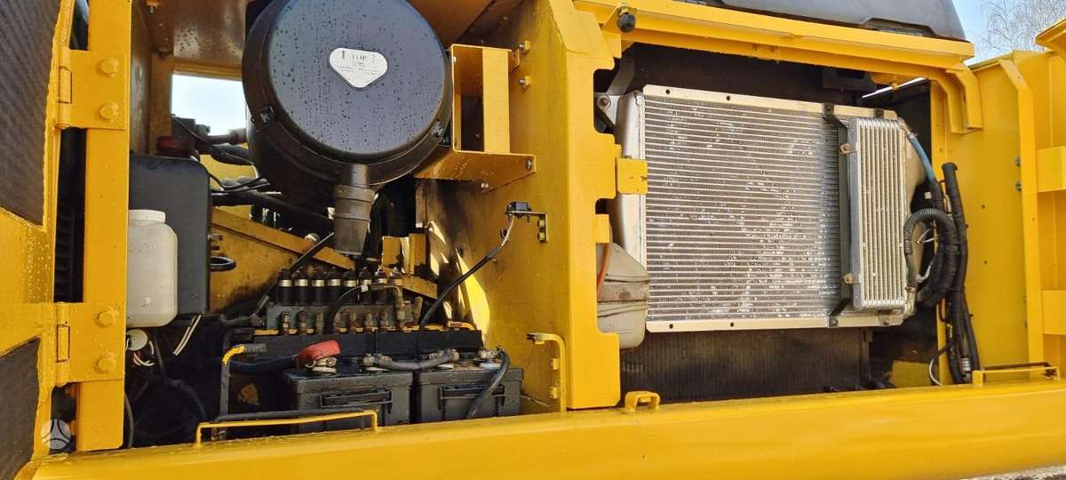 New Holland E 385, экскаваторы