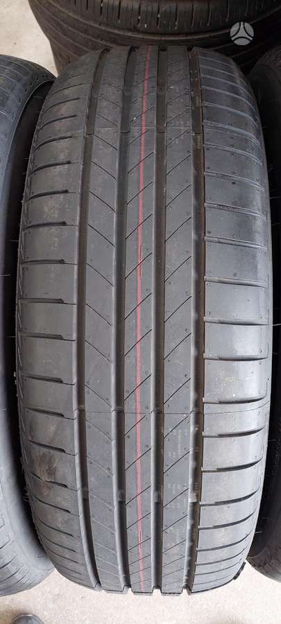 Bridgestone T005, vasarinės 215/65 R16